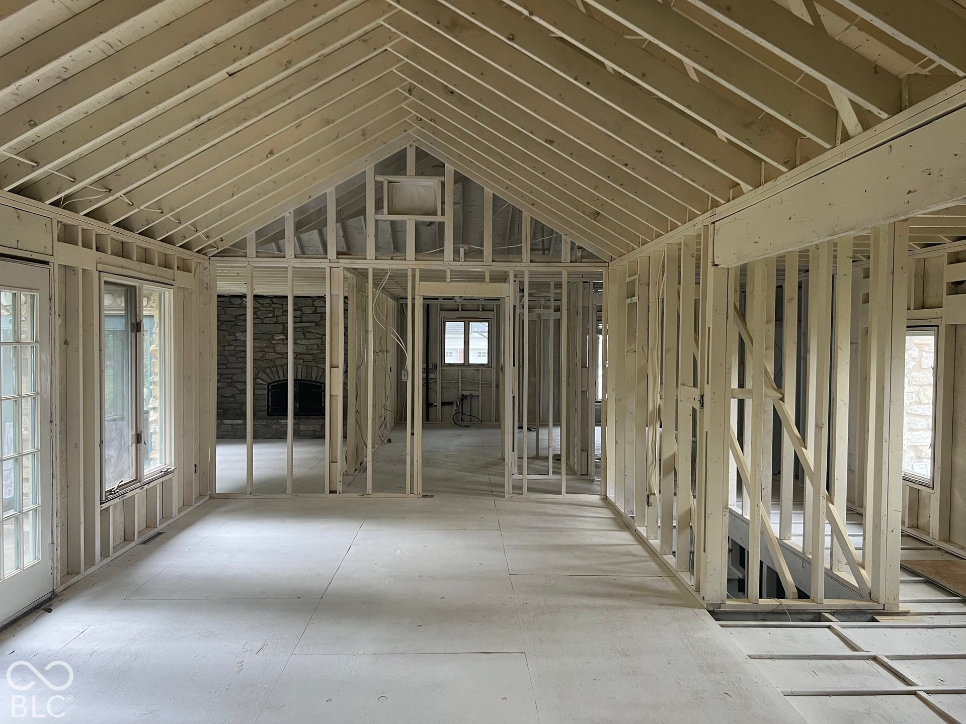Living Room Space looking eastward to family room space and kitchen