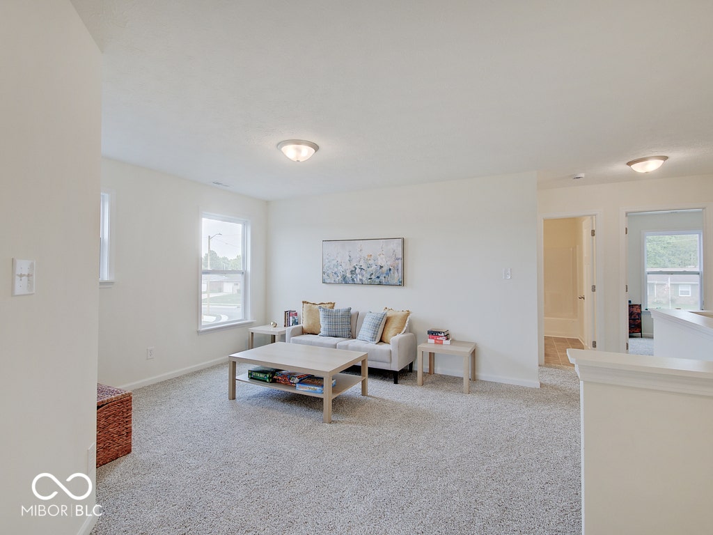 BEACON BUILDERS MODEL HOME IN WINDSTAR WOODS.