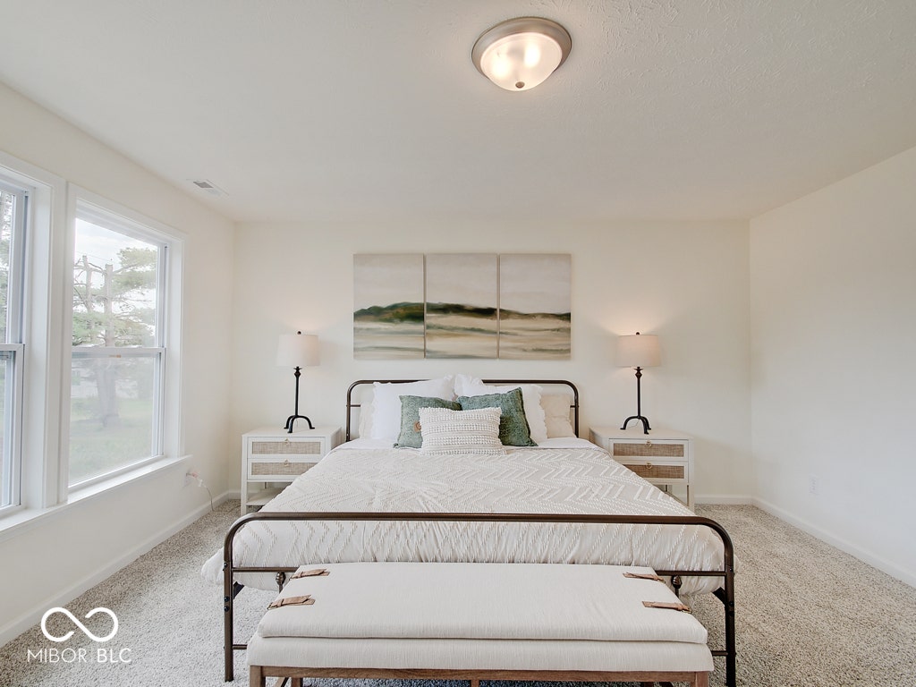 BEACON BUILDERS MODEL HOME IN WINDSTAR WOODS.
