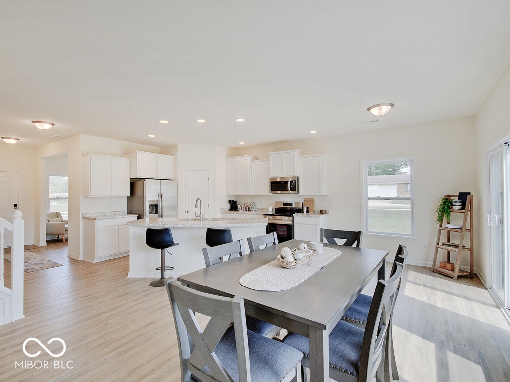 BEACON BUILDERS MODEL HOME IN WINDSTAR WOODS.