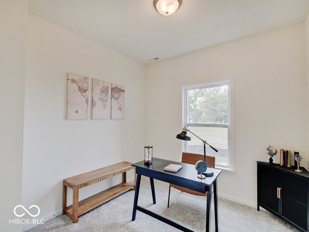 BEACON BUILDERS MODEL HOME IN WINDSTAR WOODS.