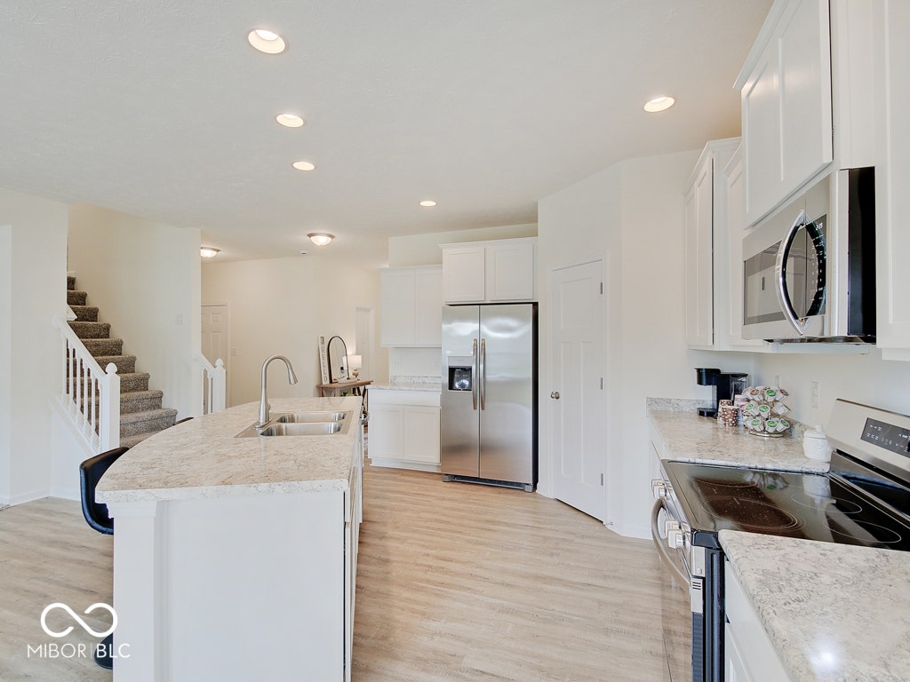 BEACON BUILDERS MODEL HOME IN WINDSTAR WOODS.