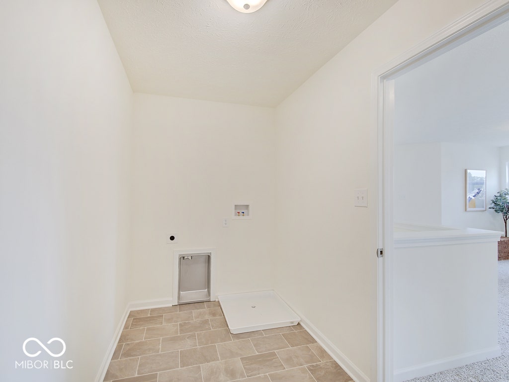 BEACON BUILDERS MODEL HOME IN WINDSTAR WOODS.