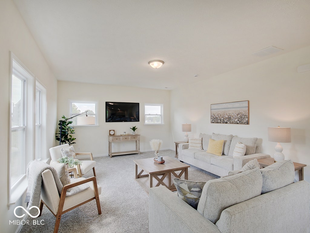 BEACON BUILDERS MODEL HOME IN WINDSTAR WOODS.