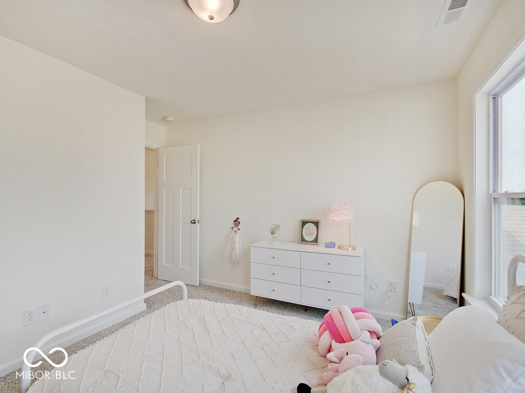 BEACON BUILDERS MODEL HOME IN WINDSTAR WOODS.