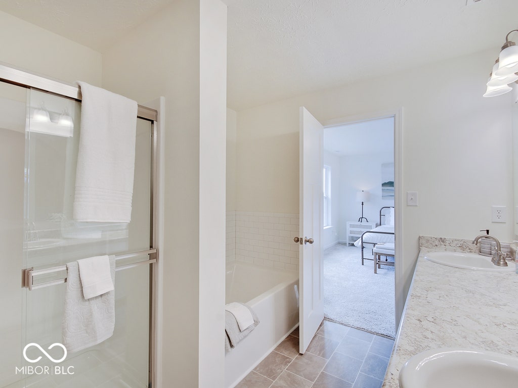 BEACON BUILDERS MODEL HOME IN WINDSTAR WOODS.