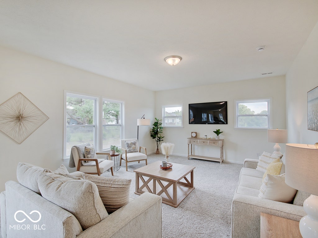 BEACON BUILDERS MODEL HOME IN WINDSTAR WOODS.