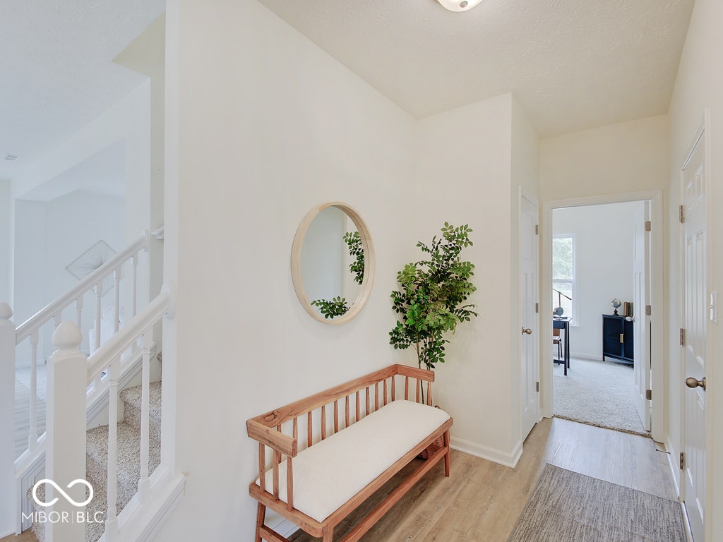 BEACON BUILDERS MODEL HOME IN WINDSTAR WOODS.