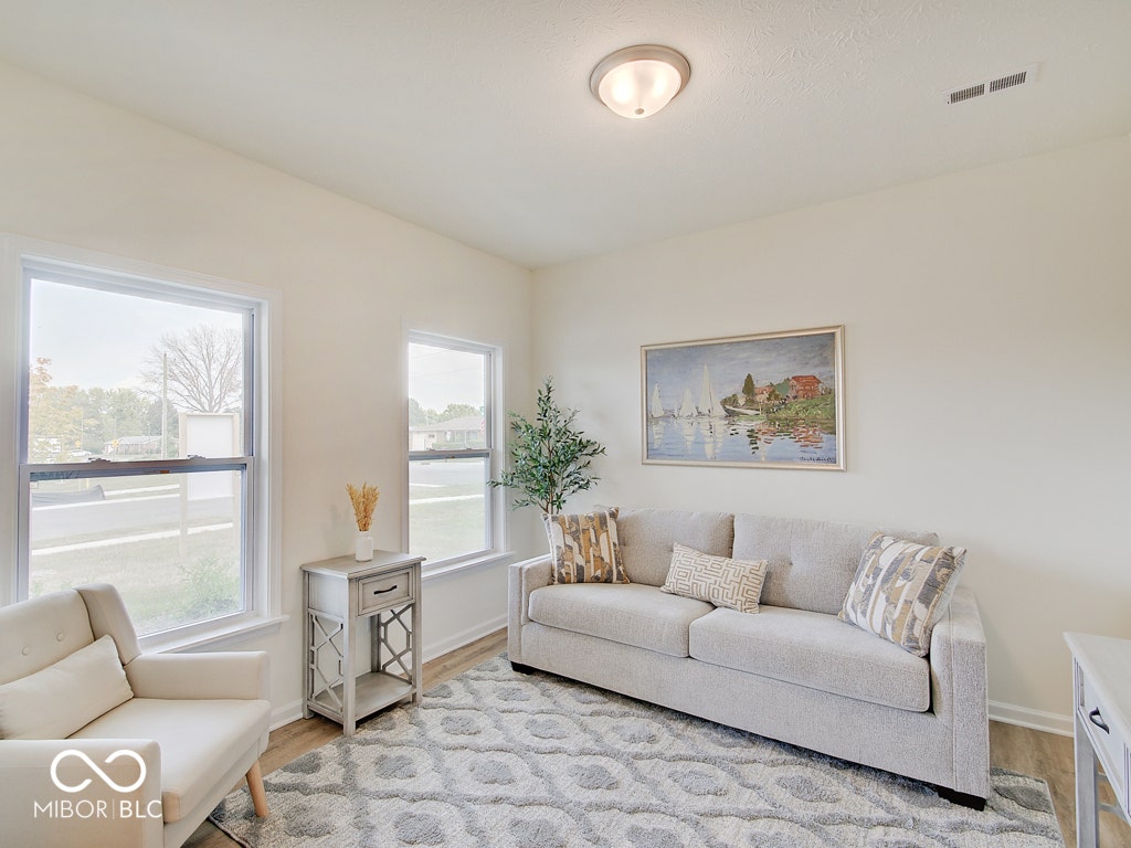 BEACON BUILDERS MODEL HOME IN WINDSTAR WOODS.