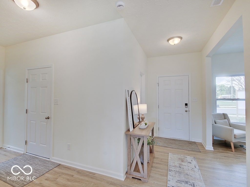 BEACON BUILDERS MODEL HOME IN WINDSTAR WOODS.