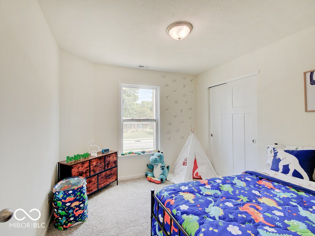BEACON BUILDERS MODEL HOME IN WINDSTAR WOODS.