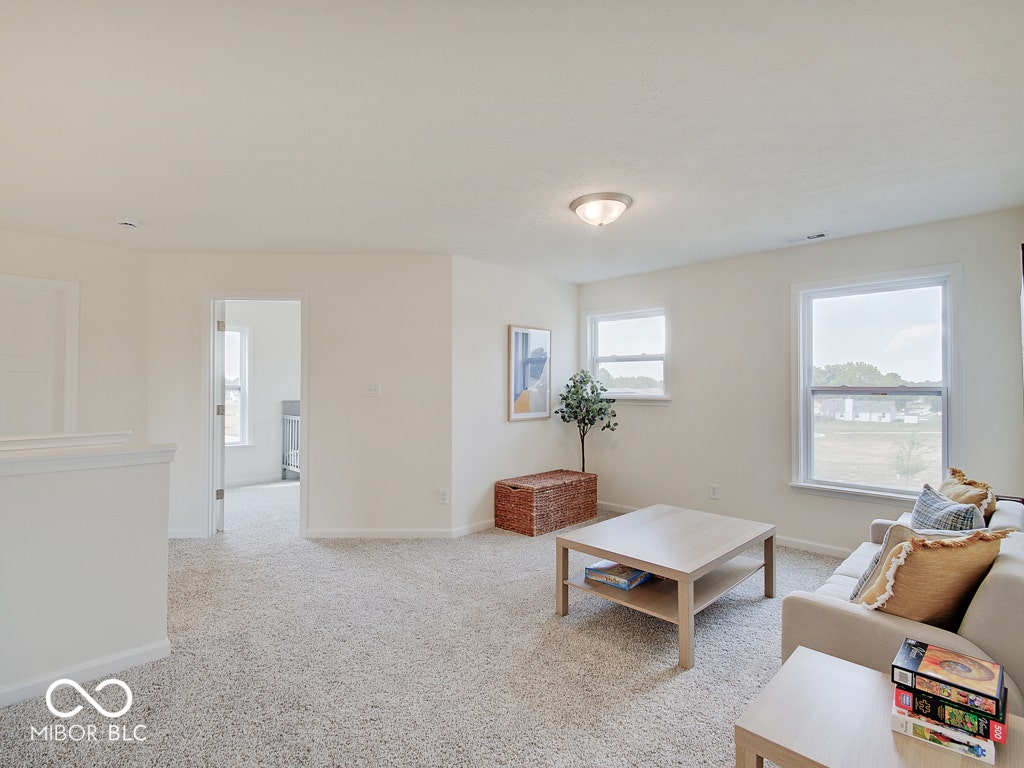 BEACON BUILDERS MODEL HOME IN WINDSTAR WOODS.