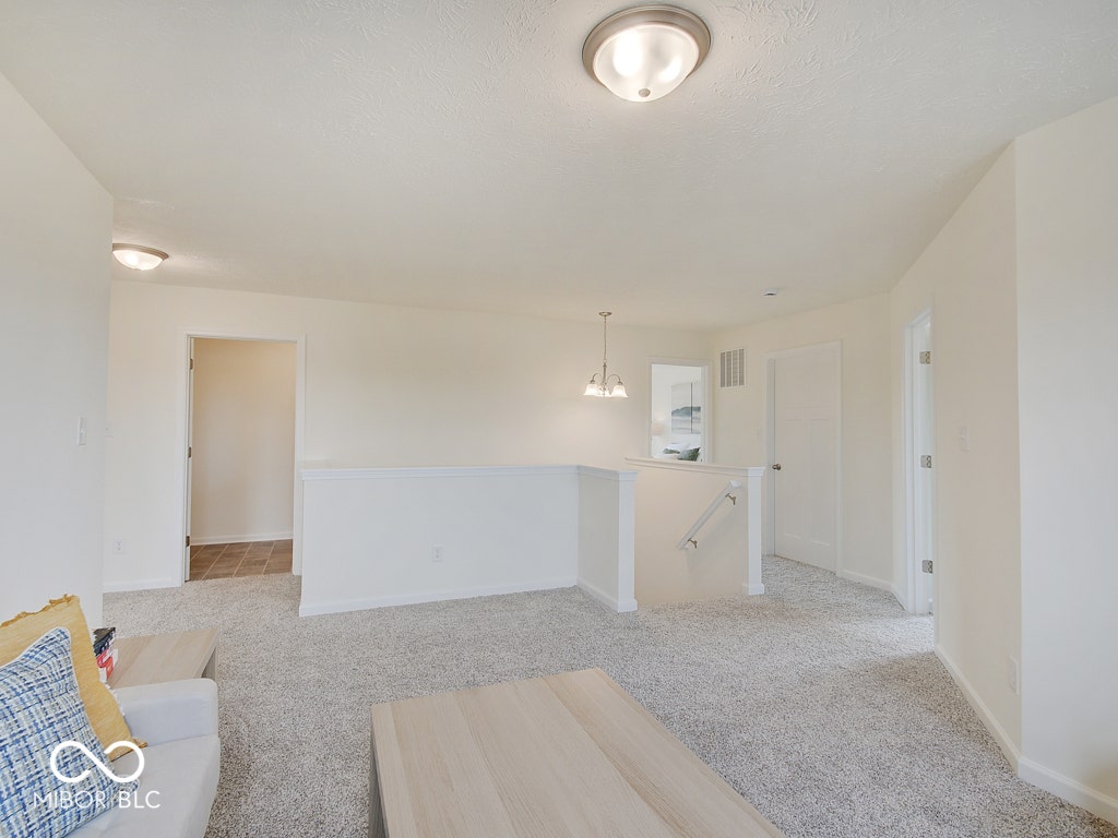 BEACON BUILDERS MODEL HOME IN WINDSTAR WOODS.