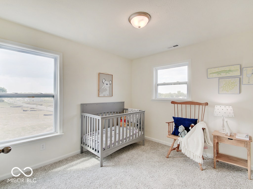 BEACON BUILDERS MODEL HOME IN WINDSTAR WOODS.