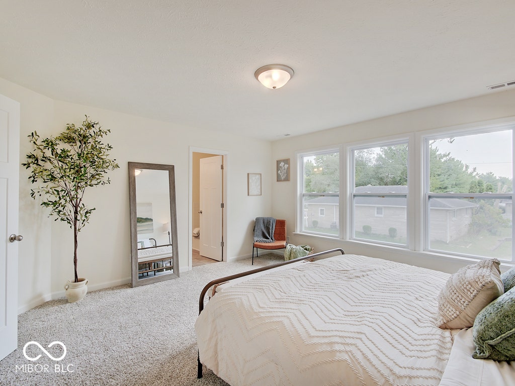 BEACON BUILDERS MODEL HOME IN WINDSTAR WOODS.