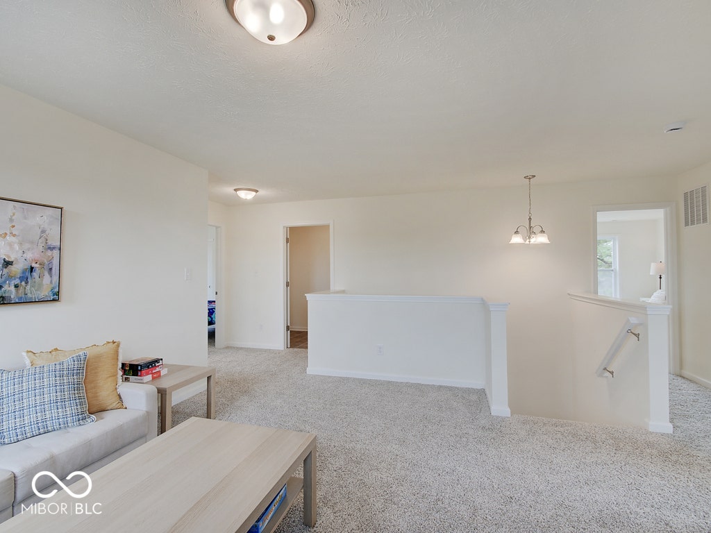 BEACON BUILDERS MODEL HOME IN WINDSTAR WOODS.