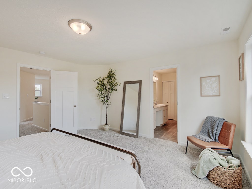 BEACON BUILDERS MODEL HOME IN WINDSTAR WOODS.