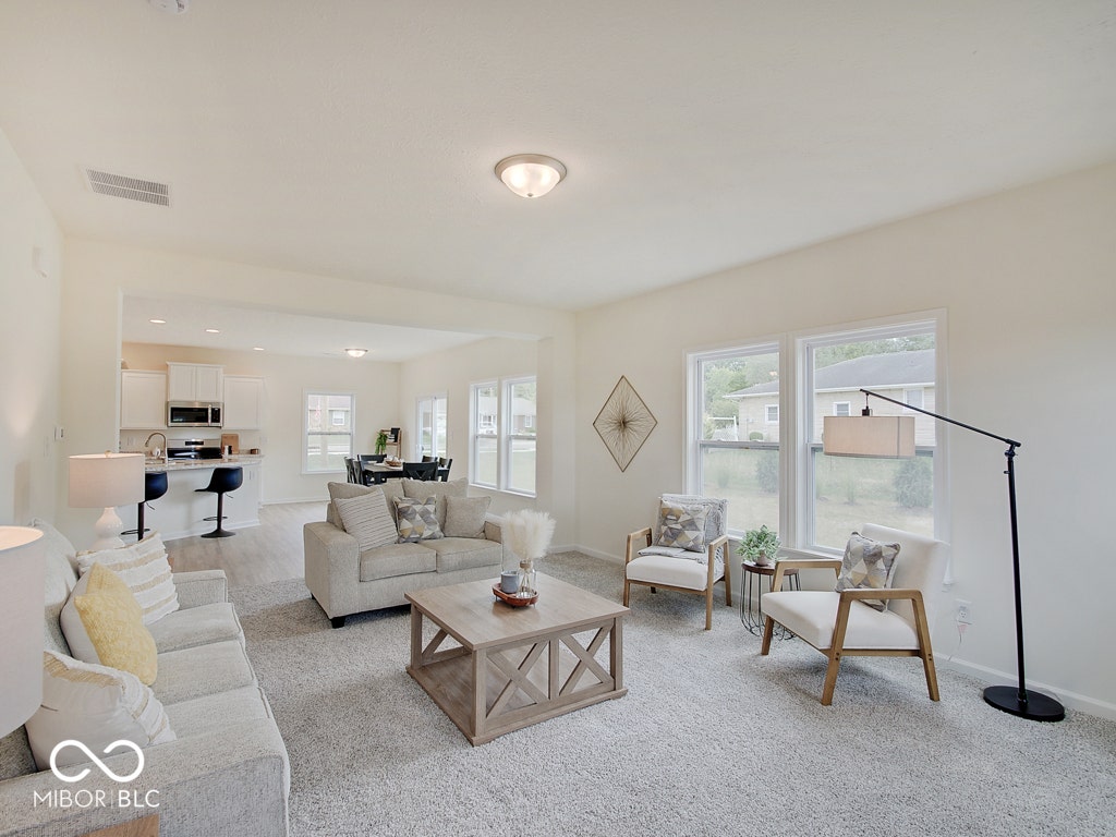 BEACON BUILDERS MODEL HOME IN WINDSTAR WOODS.
