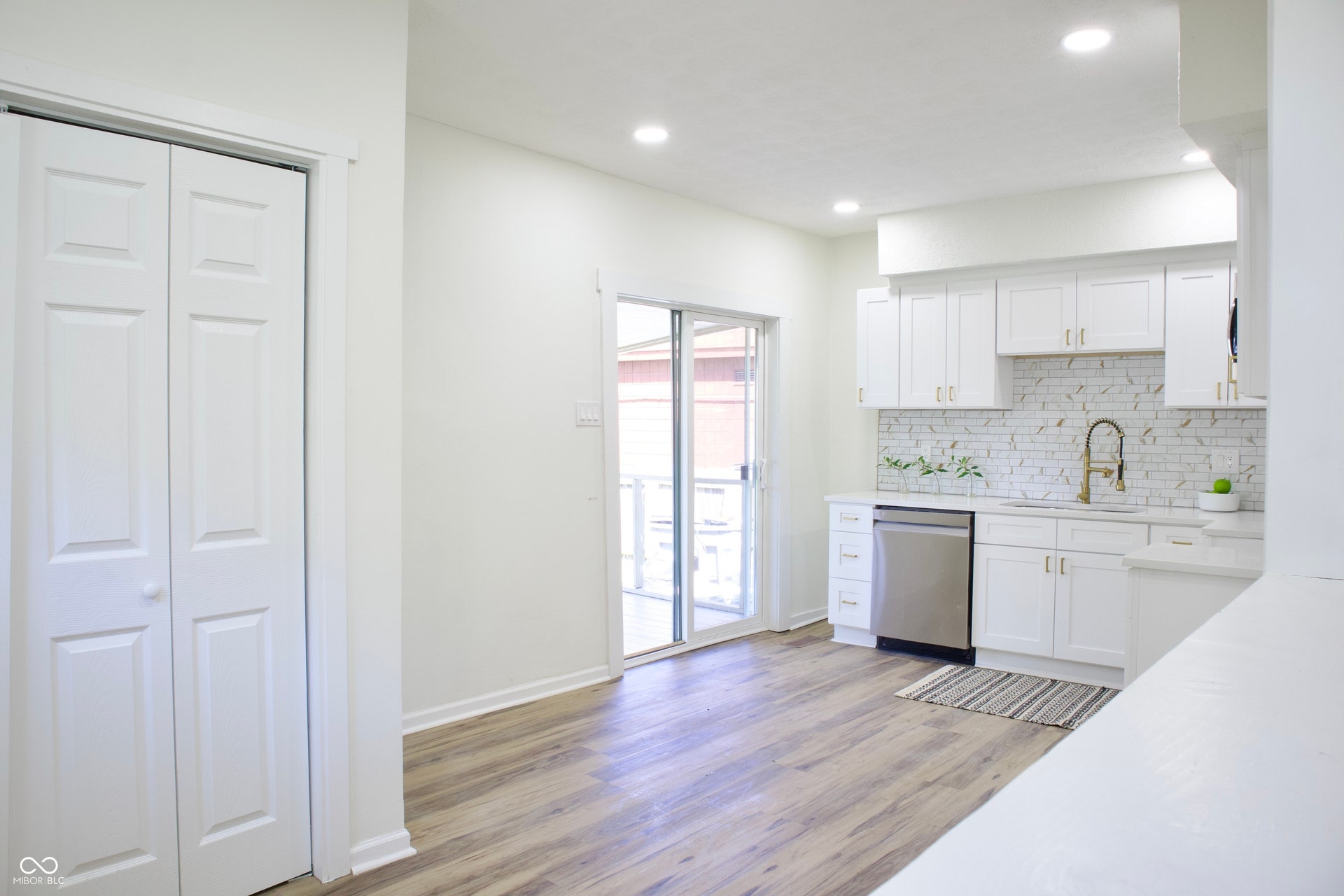 474 N Randolph Street, Indianapolis, IN 46201 The kitchen opens to a sliding glass door, so you can step right out to the back deck.