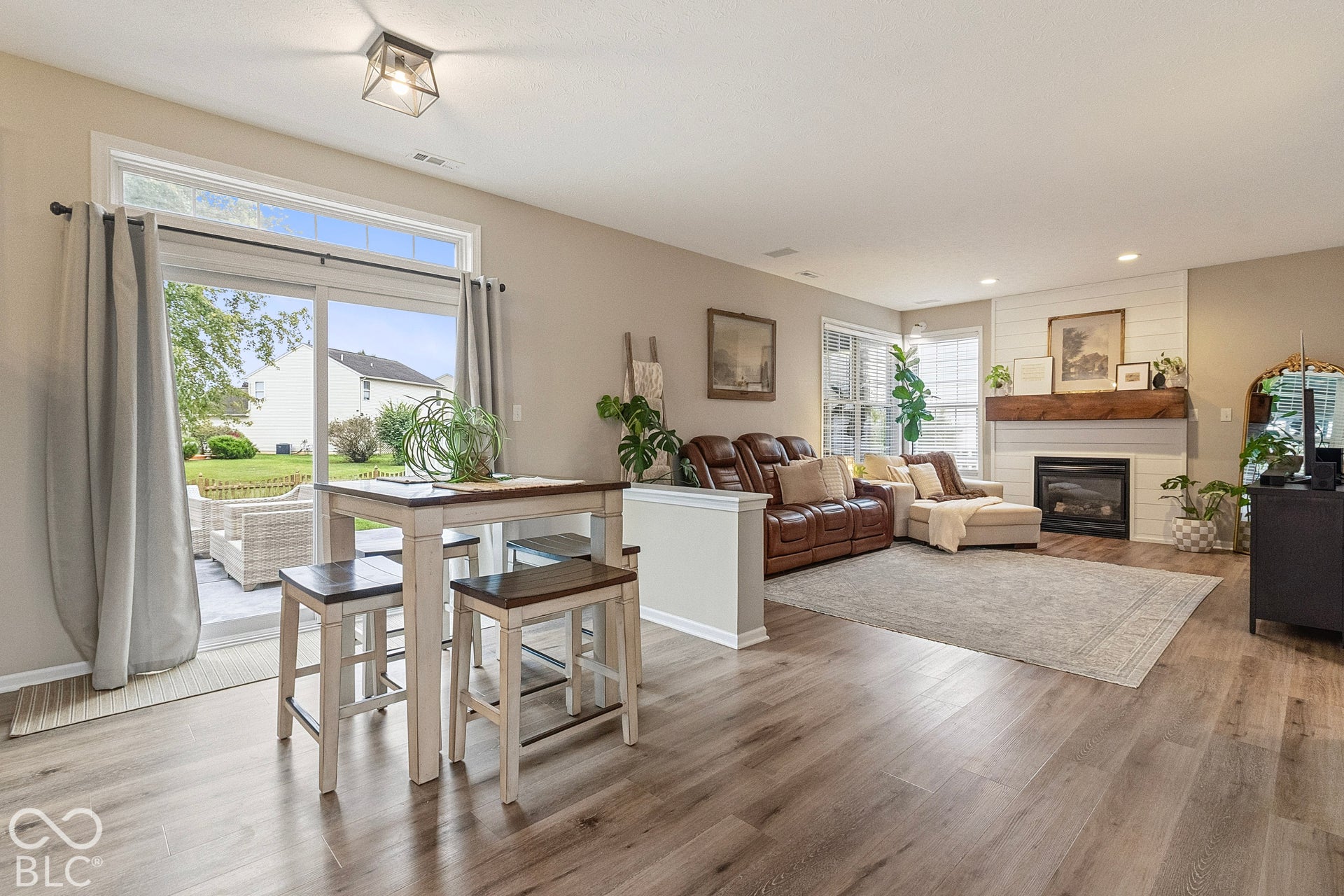 A bright, open area that naturally supports everyday living, casual meals, working from home, or gathering with guests. Its open connection to the living room creates an easy flow for entertaining, while the large windows and patio access bring in na