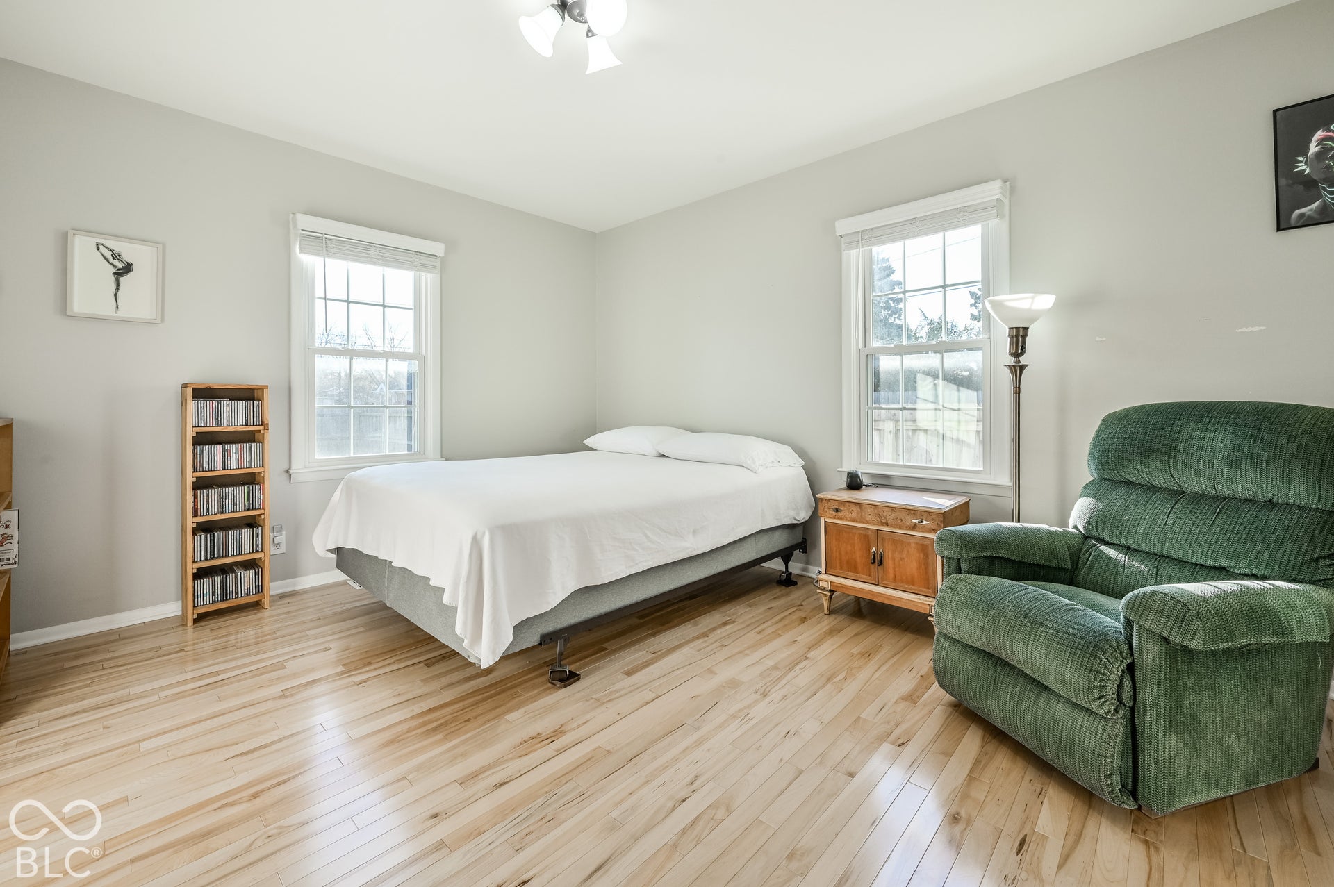 Spacious bedroom with hardwood floors