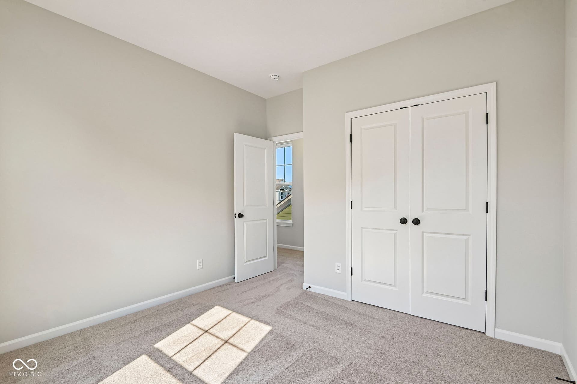 15691 Showdown Road, Noblesville, IN 46060 Neutral tone walls and carpeting complement the white trim and doors
