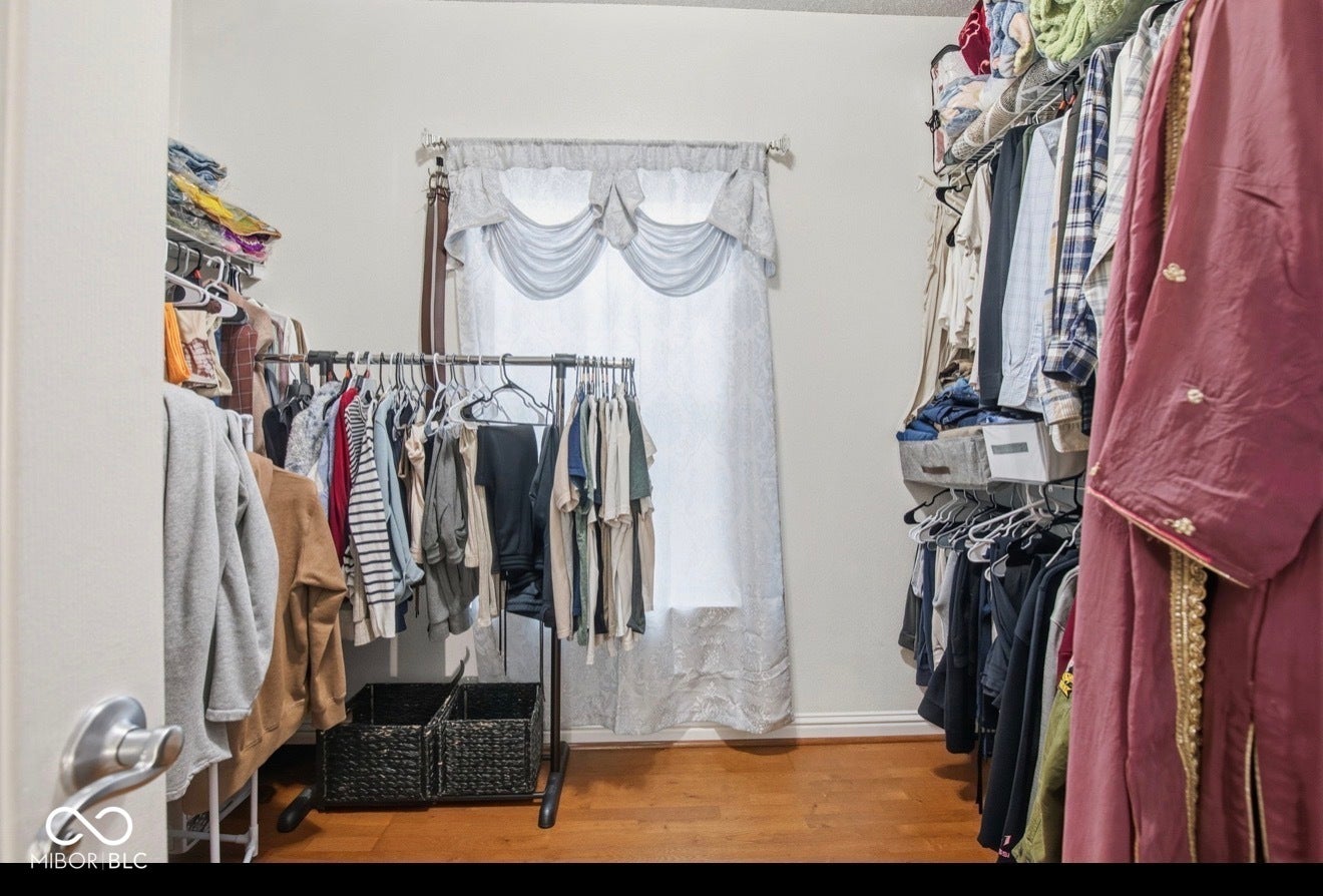 344 Legacy Boulevard, Greenwood, IN 46143 walk in closet featuring light wood-style floors