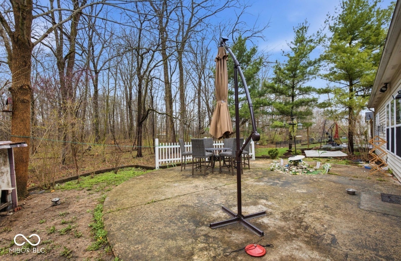 344 Legacy Boulevard, Greenwood, IN 46143 view of yard with a patio and outdoor dining area