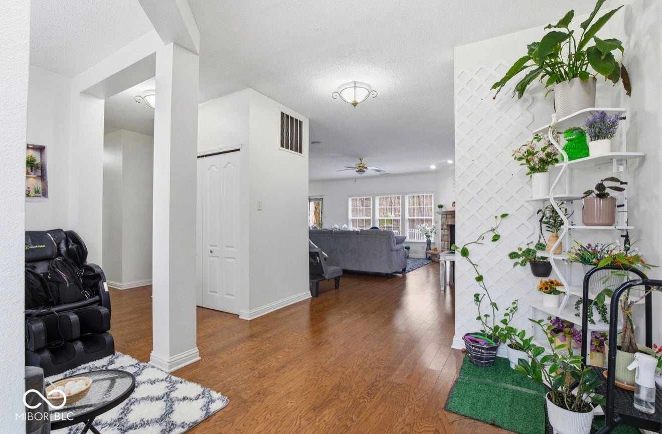 344 Legacy Boulevard, Greenwood, IN 46143 interior space with baseboards and dark wood-type flooring