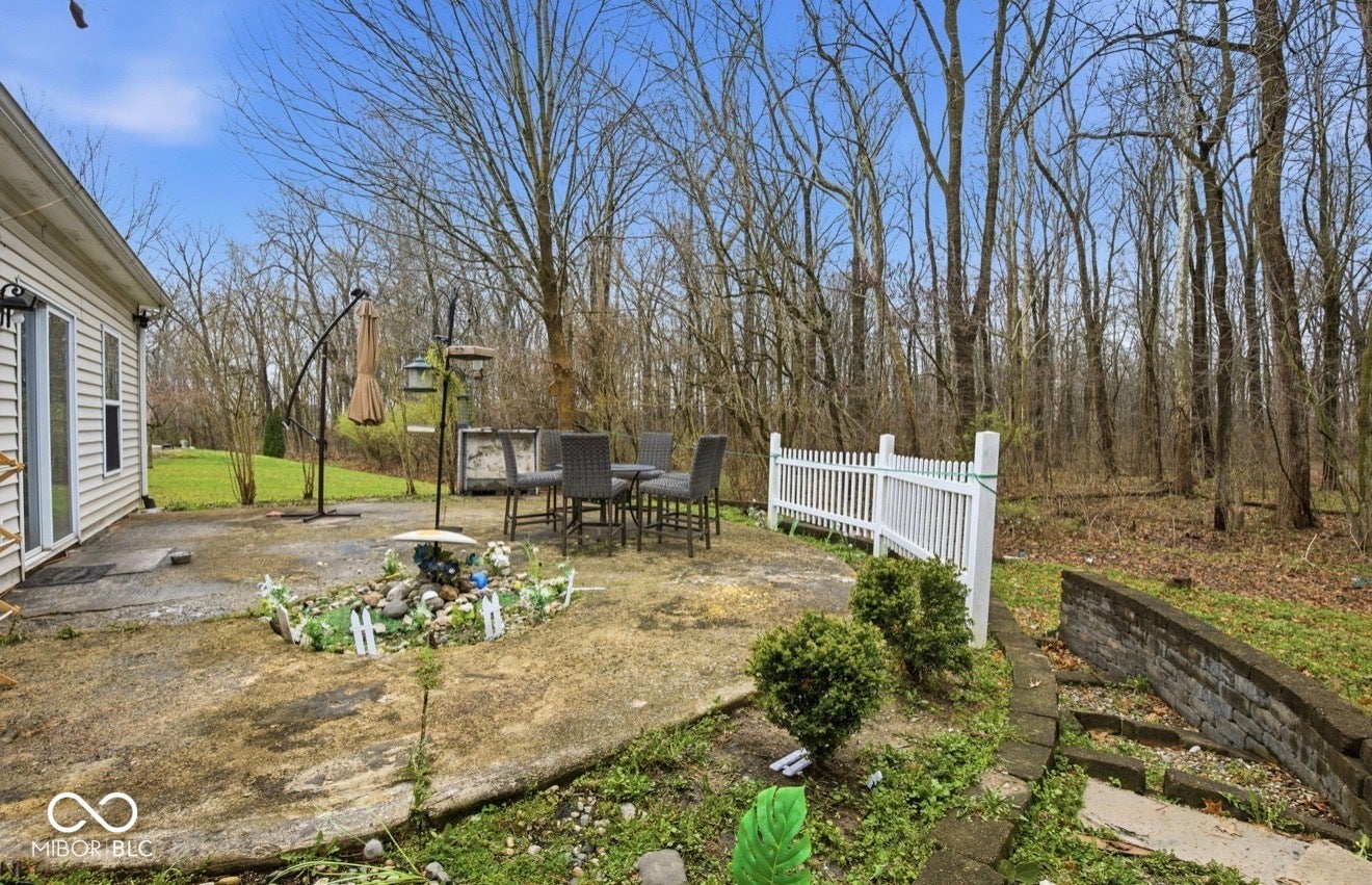 344 Legacy Boulevard, Greenwood, IN 46143 view of yard with a patio area and outdoor dining space
