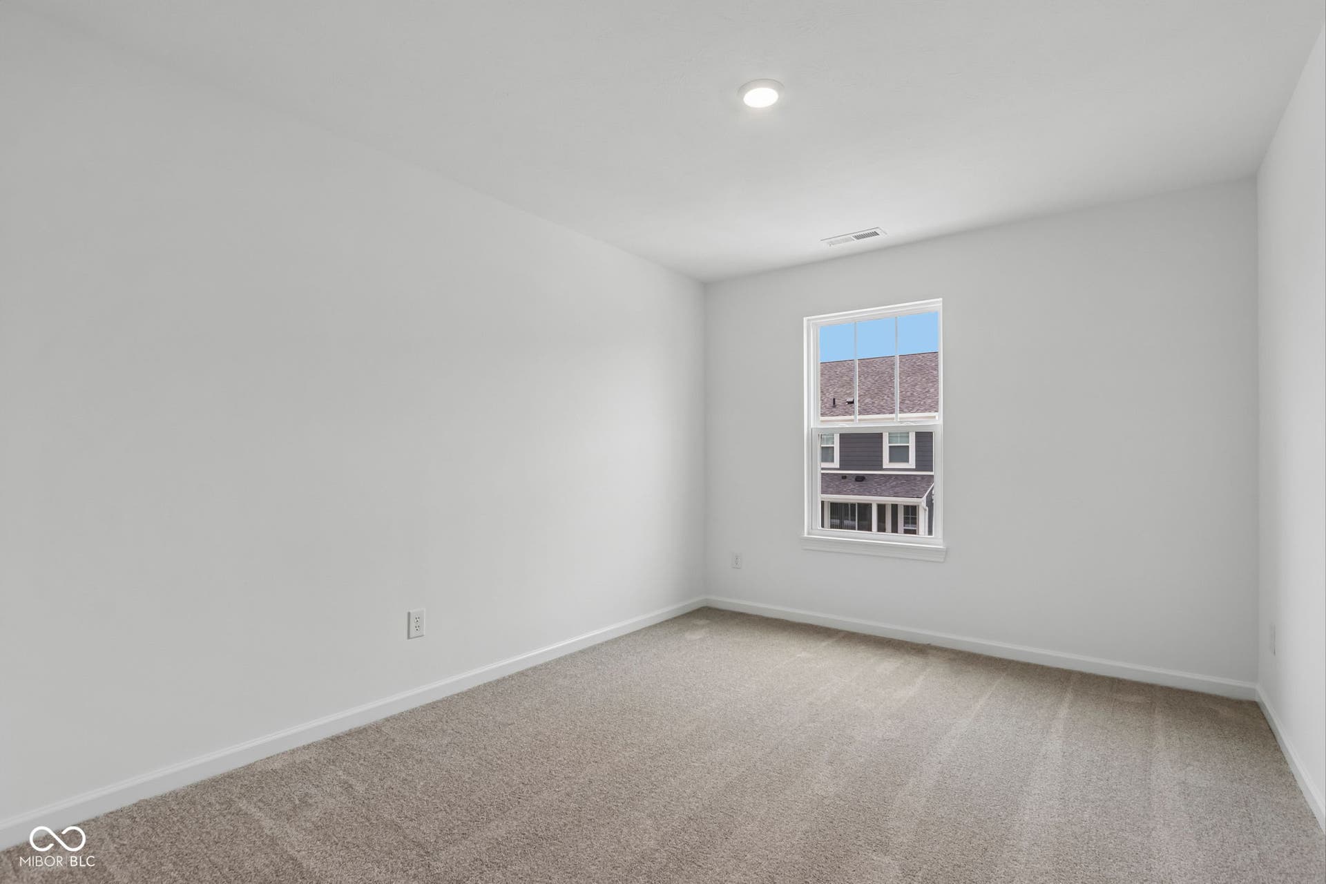 5748 Arcade Boulevard, McCordsville, IN 46055 Bright room featuring a single window, recessed lighting, and neutral carpet