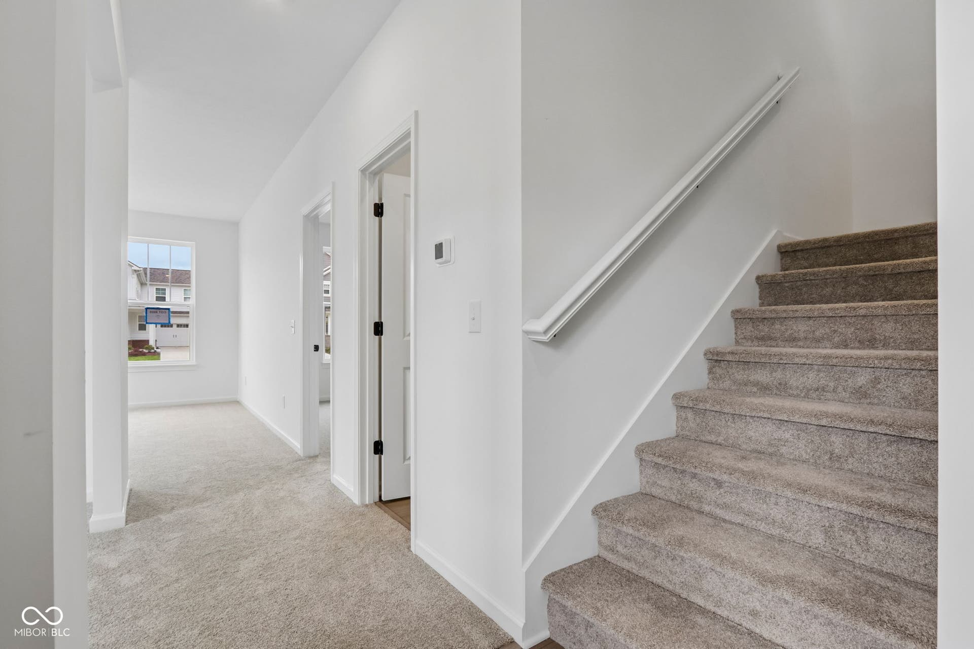 5748 Arcade Boulevard, McCordsville, IN 46055 Carpeted staircase with white handrail