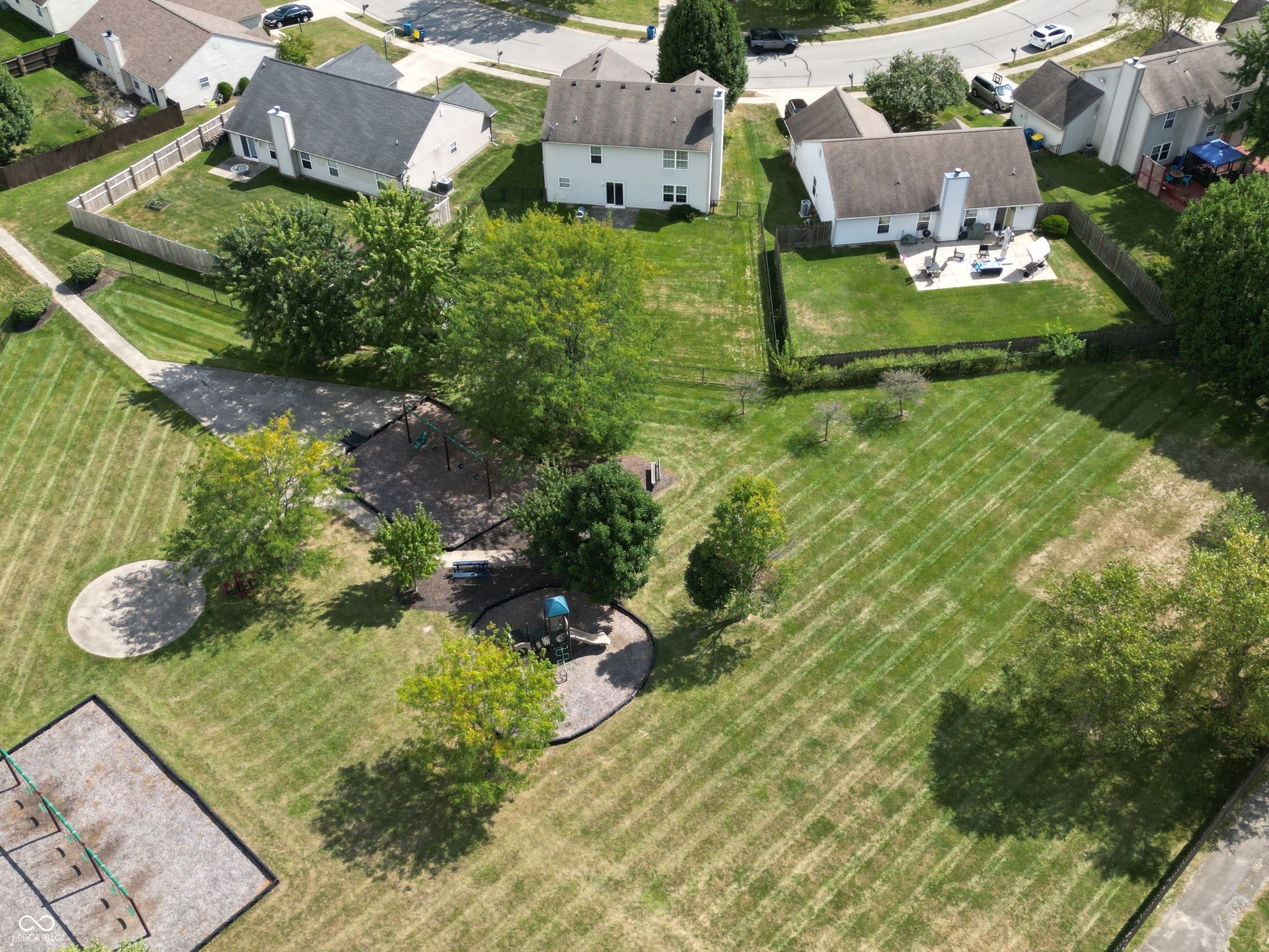 Aerial view showing the park to the rear of the residence.