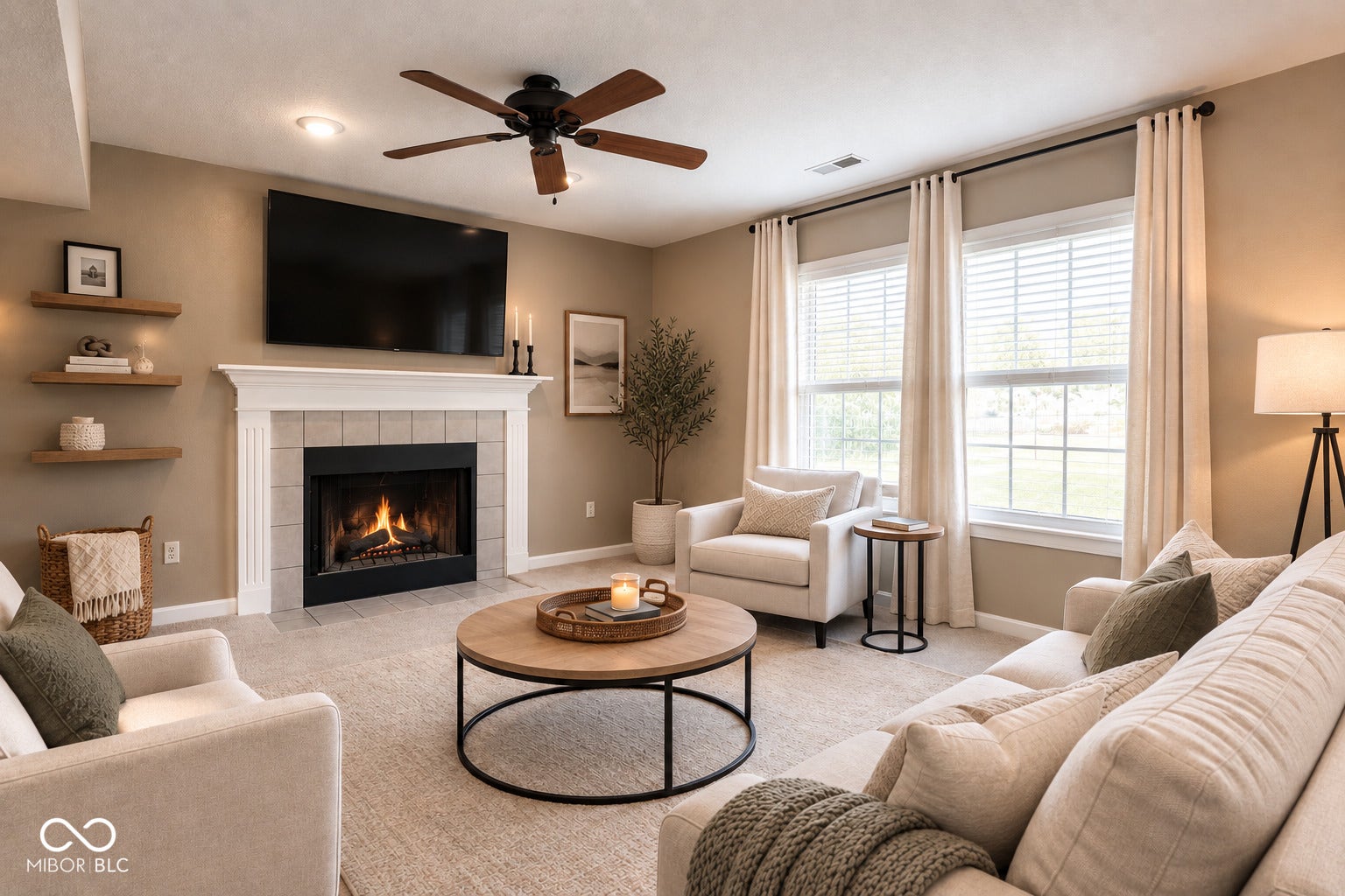 Family Room with fireplace, new carpet and window treatments stay with the home.