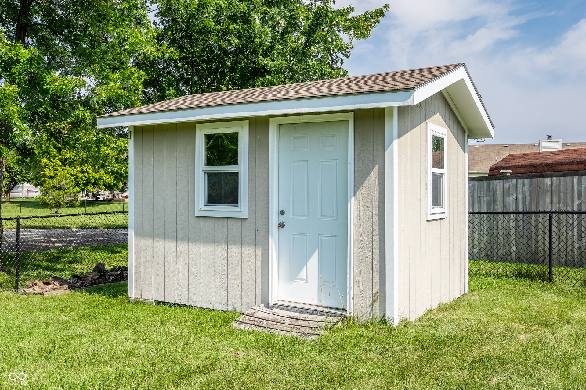 Large shed perfect for lawn equipment, bikes or other storage needs.