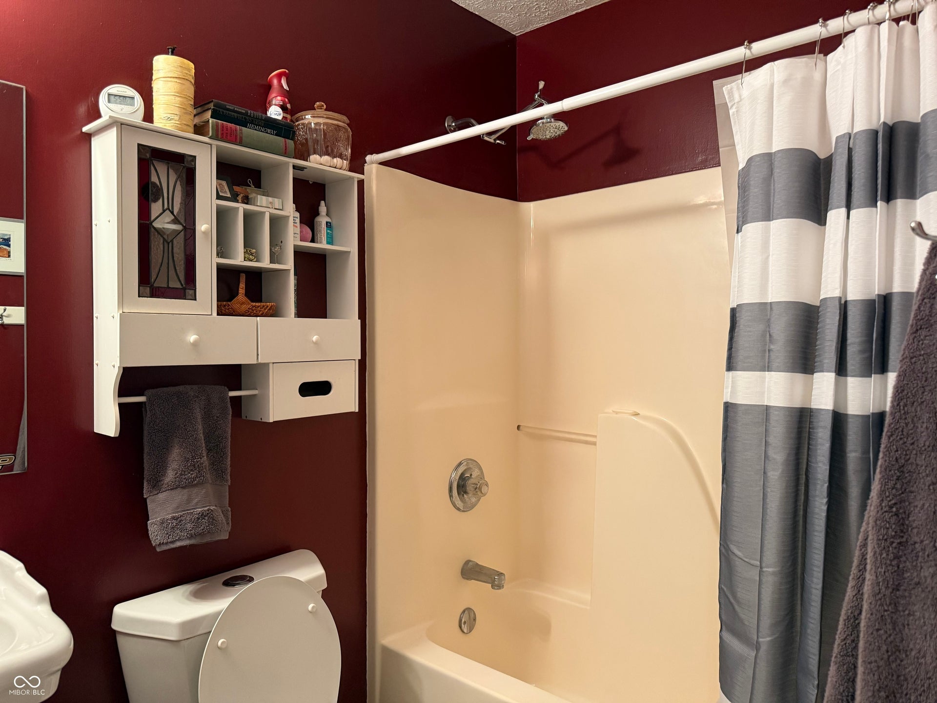 2117 Witt Road, Lebanon, IN 46052 Built-in wall cabinet with glass-paneled door and integrated towel bar