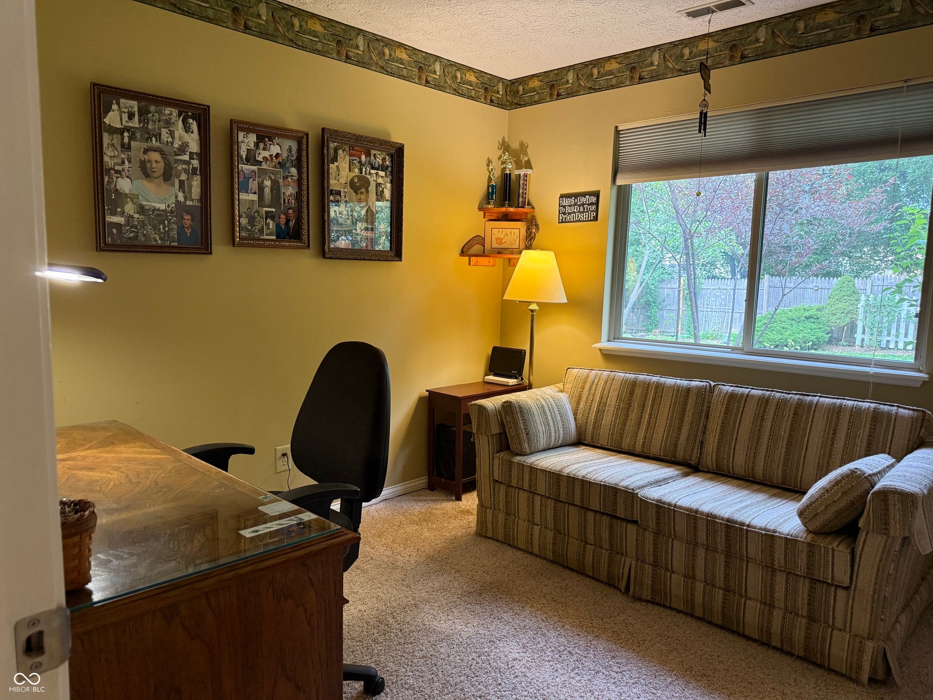 2117 Witt Road, Lebanon, IN 46052 Carpeted, window with cellular shade, and neutral wall tones. also be an office.
