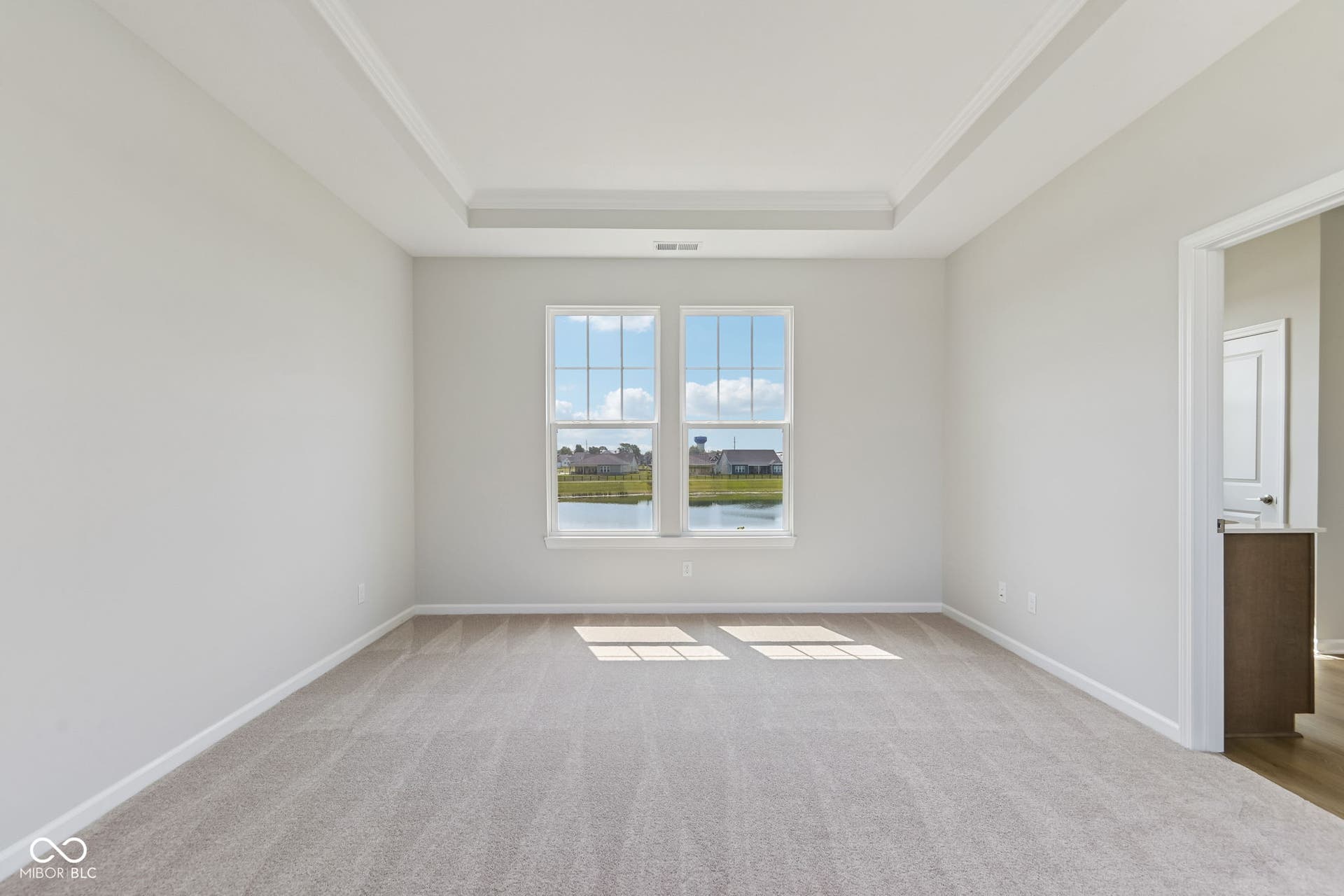 15762 Showdown Road, Noblesville, IN 46060 Spacious room with a double window overlooking a pond