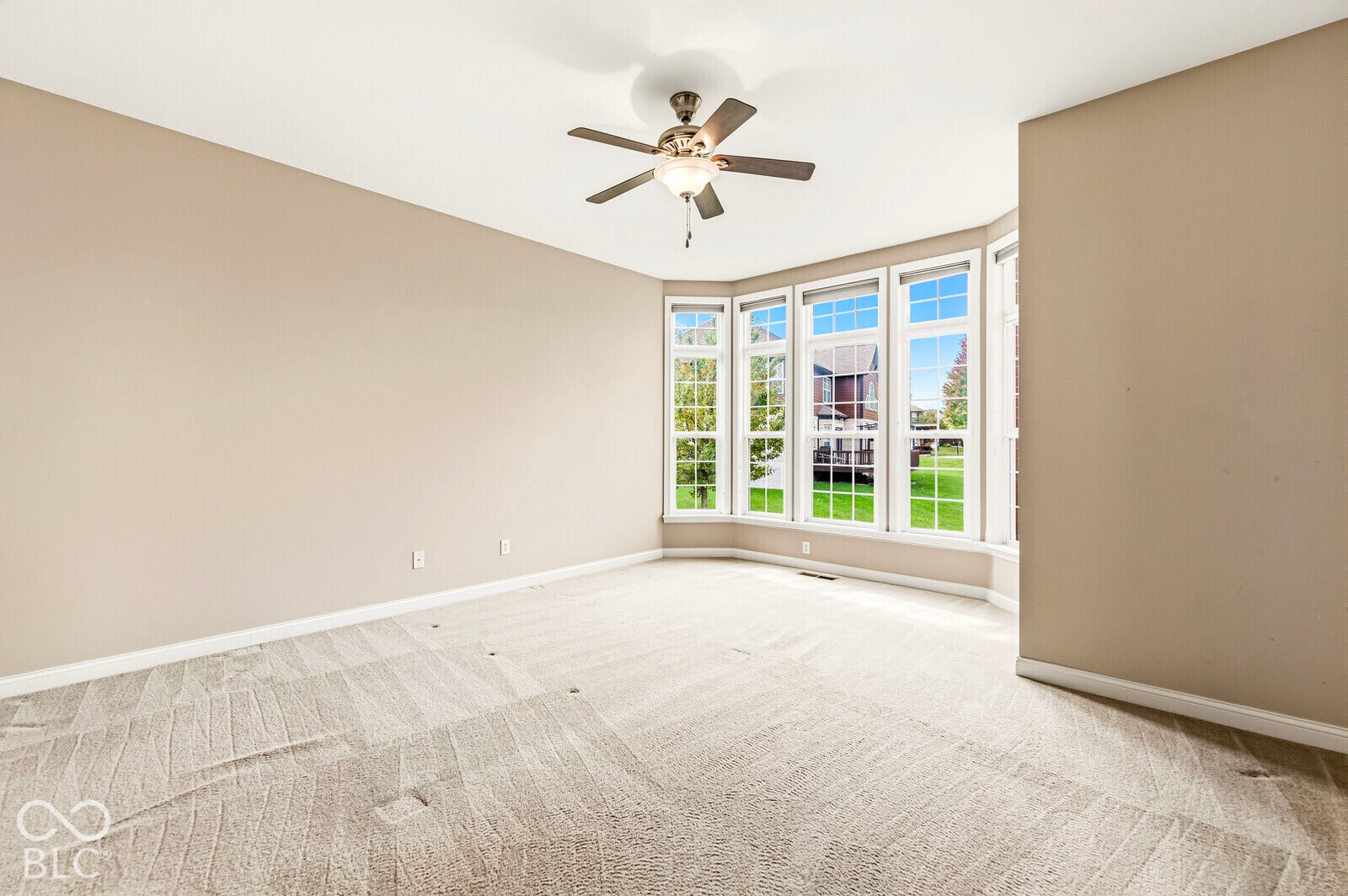 Primary bedroom with 10 foot ceilings on main level