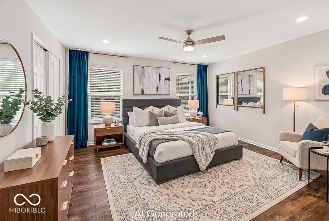 Virtually Altered - Spacious room featuring wood-finish flooring, two windows with blinds, a ceiling fan with integrated lighting, and recessed lighting