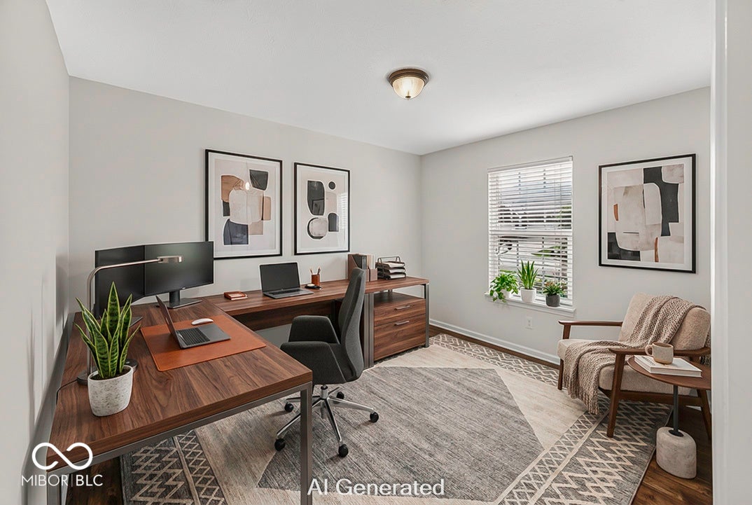 Virtually Altered - Room featuring light gray walls, wood-finish flooring, and a flush-mount ceiling light fixture