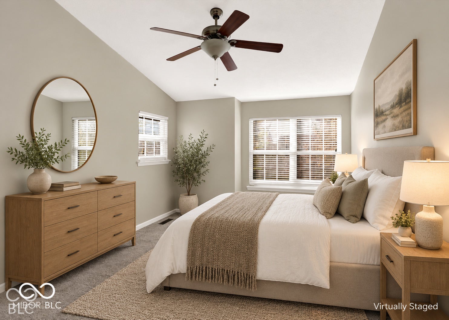 Vaulted ceiling with ceiling fan, multiple windows with blinds, and carpeted flooring