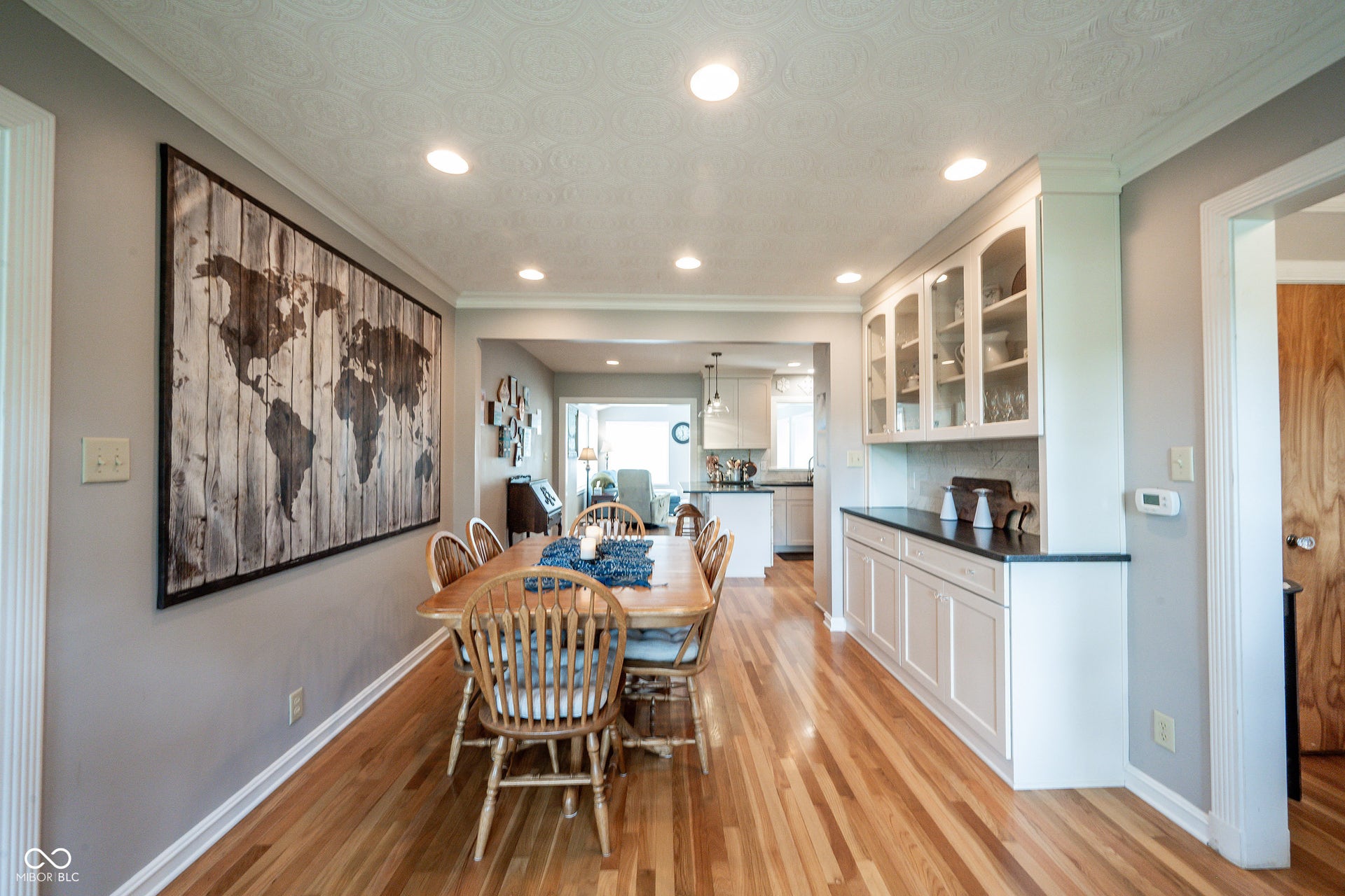 Dining Room with Custom Built In Buffet, 3/4" Hardwood Flooring and Recessed Can Lighting provides flexable furniture placement