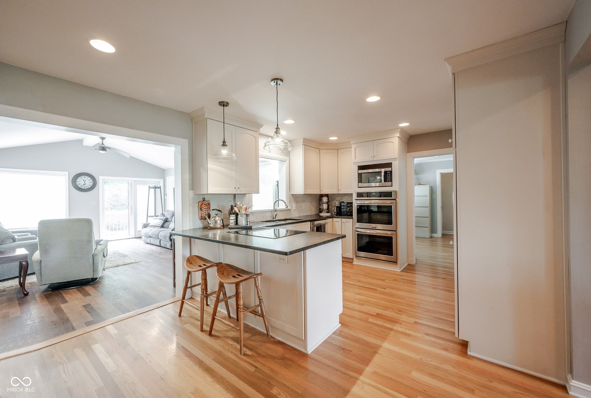 Completely Remodeled Kitchen with 3/4" Hardwood Flooring, Recessed Can Lighting, Breakfast Bar