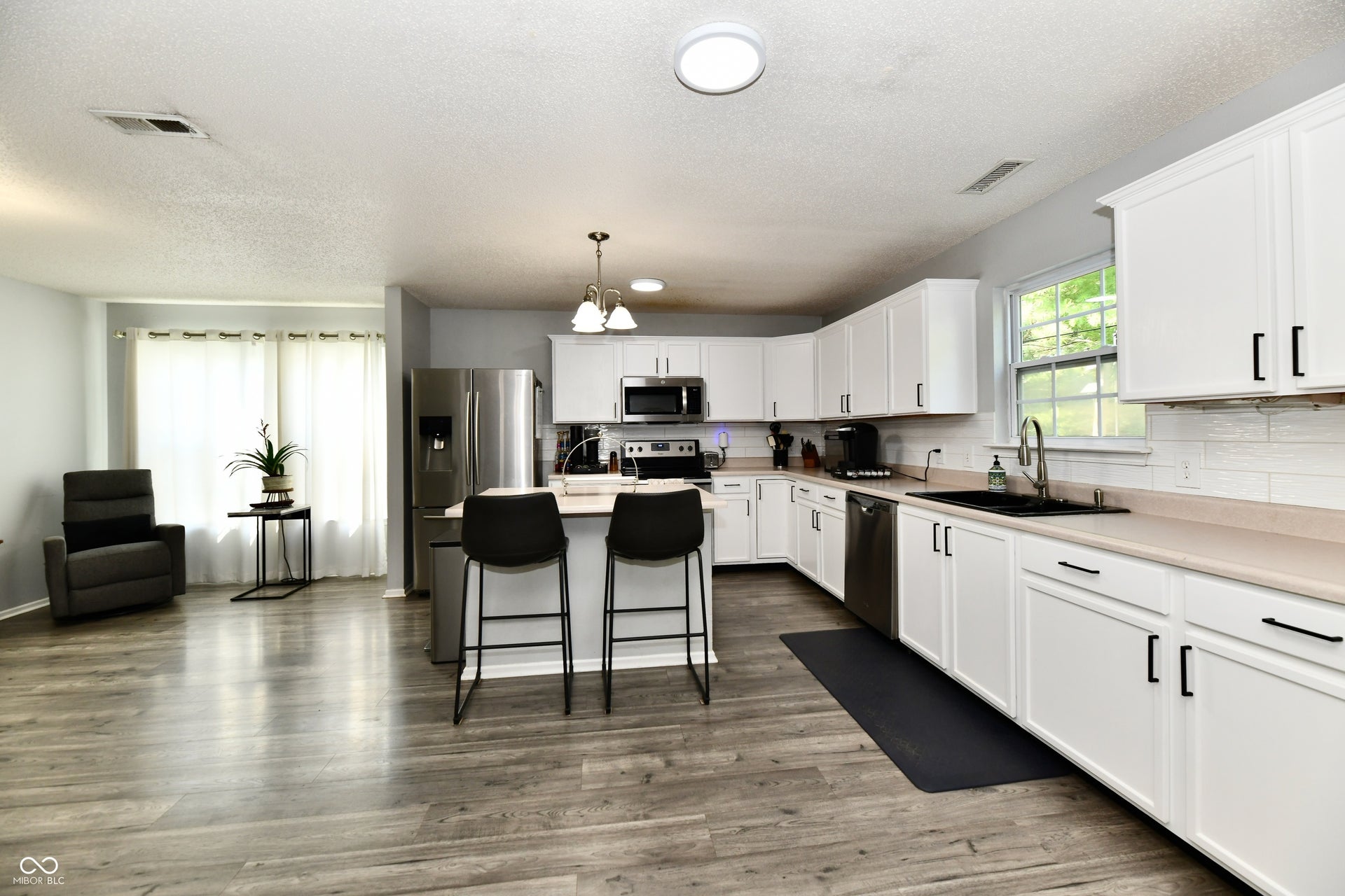 Newer ss appliances and tile backsplash