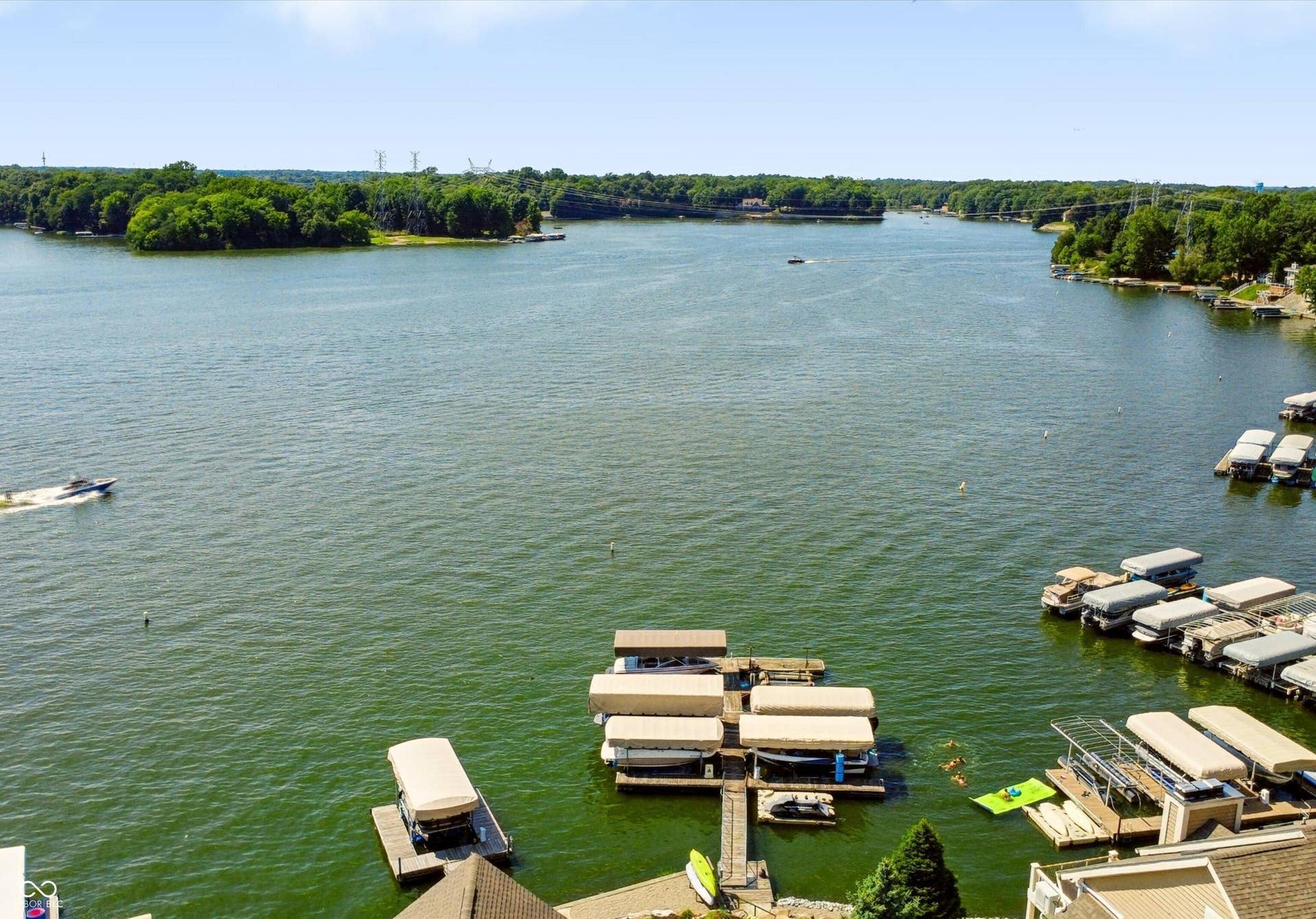 2 Docks included!  Last 2 docks on south side.  (had white/red speed boat on lift)