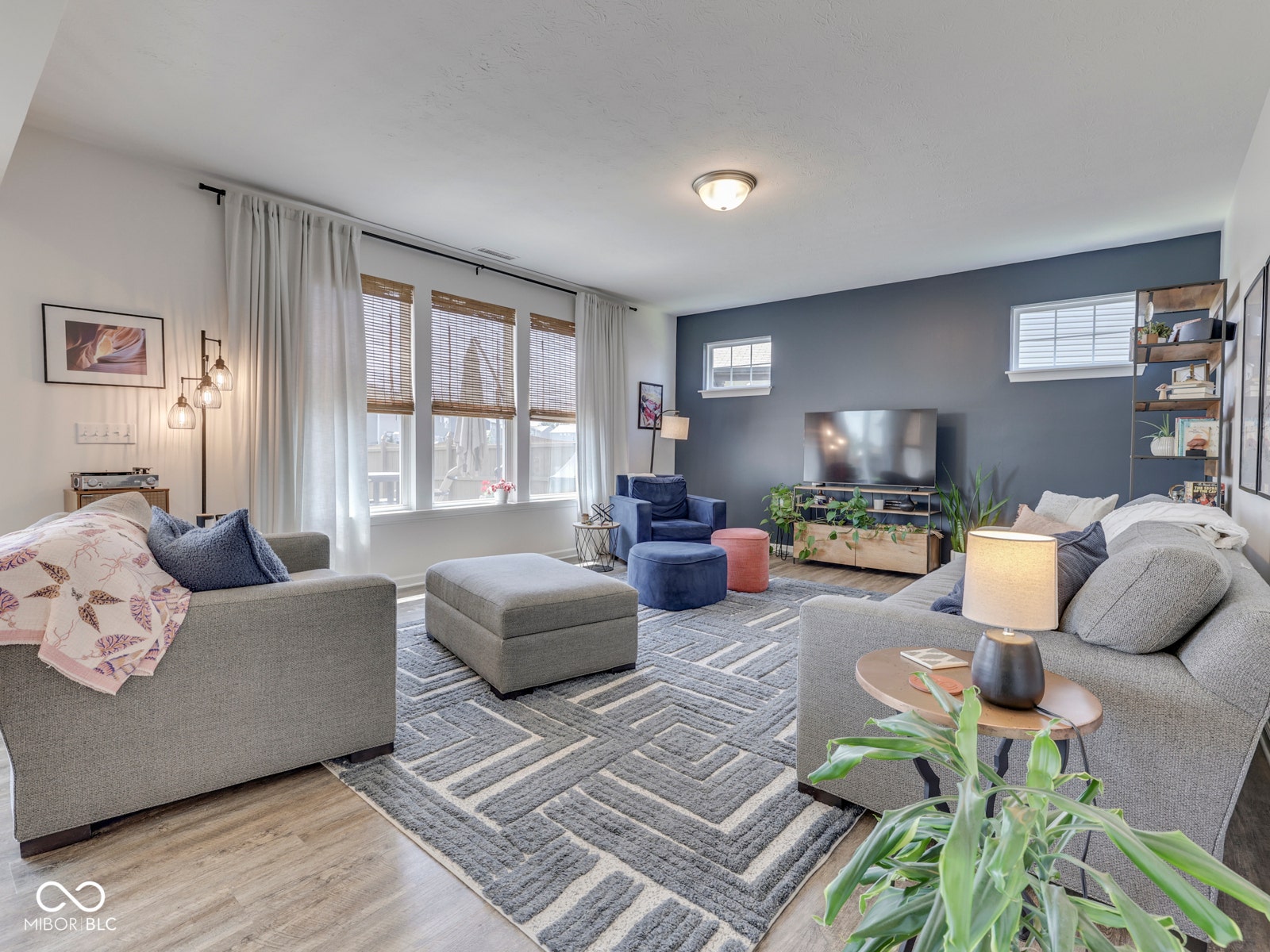 Spacious family room - fabulous natural light floods the space