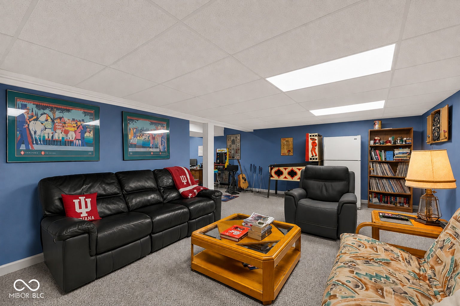 A spacious basement rec room, ready for movie nights or just kicking back.