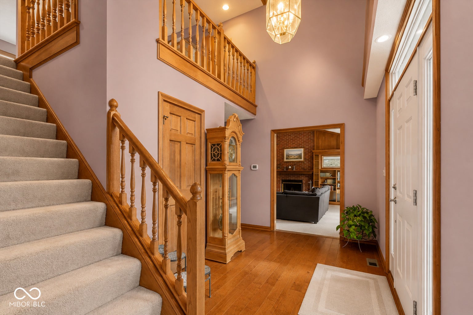 entryway opens up to every room on the main level, with a loft area that looks down over the space below.