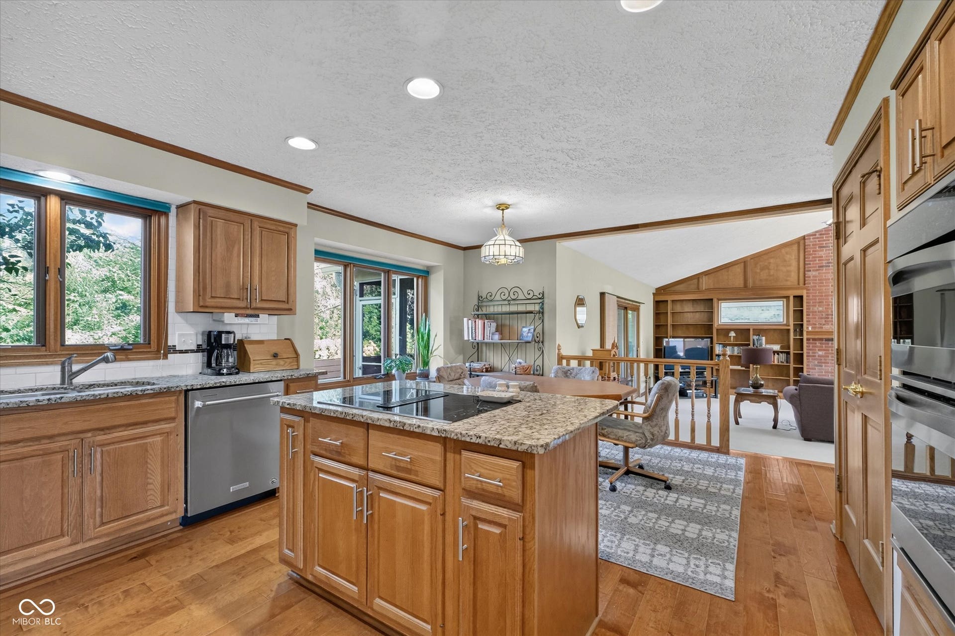 Kitchen opens up to eat-in area and great room.
